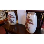 A pair of large porcelain vases decorate
