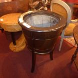 A C19th coopered oak wine cooler with le