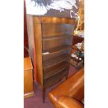 An inlaid mahogany open bookcase of bowe