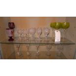 A collection of glass ware including hock glasses and various wine glasses