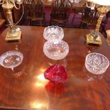 A collection of three crystal fruit bowls, together with a similar bowl and a red glass bowl