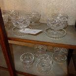 A set of eleven crystal sundae dishes, together with another similar
