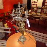 A gilt metal seven candle candelabra in