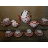 A Japanese porcelain tea service decorat