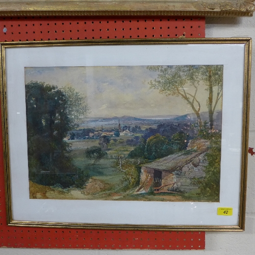 A watercolour rural scene with cattle in the distance indistinctly signed lower left