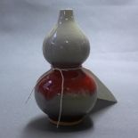 A small double gourd pink glazed vase