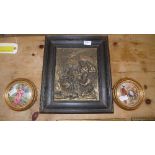 A religious spelter framed plaque and two porcelain painted oval pictures one titled Cries of London