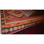 An extremely fine south west Persian Qashgai Kilim 318 cm x 132 cm with triple pole medallion on a