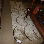 A silken 'Rug Company' runner' with geometric design