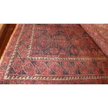 A fine North East Persian Hatchlie rug 200 cm x 125 cmn repeating panel motifs on a terracotta