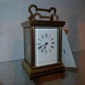 An early C20th  carriage clock made by the covailliet family with Roman numerals to the dial