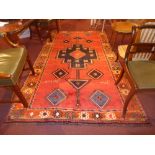 A fine South West Persian Lori carpet, 280cm x 160cm, central pendant medallion on a terracotta