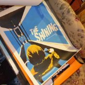 A collection of four hand painted posters including The Shining and A Clockwork Orange