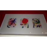A set of three Joan Miro lithographs in a single mount, unsigned, 'Sun, Moon, Star' glazed and