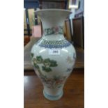 A Chinese style vase with pictorial detail
