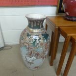 A large satsuma vase with floral detail