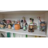 A collection of various Toby jugs and figurines