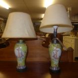 A pair of Chinese Famille Jaune vases converted to lamps with figural reserves