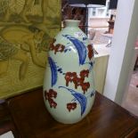 A Chinese style glazed vase with floral decoration