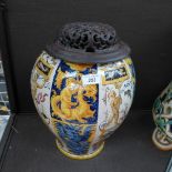 A large Majolica vase finely decorated in yellow and blue enamel designs