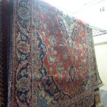Two similar central Persian Kashan rugs