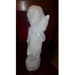 A white painted reconstituted stone figure of a boy