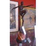 A bronze cast of an Art Deco dancer on marble base