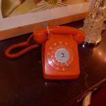 A retro French orange telephone