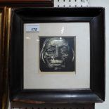 A block print of womans face