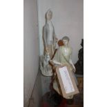 A Lladro figure of a seated man together with a Casades figure of a lady with a dog and two Tengra