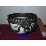 A Serves style porcelain bowl with bronzed lion mark mounts