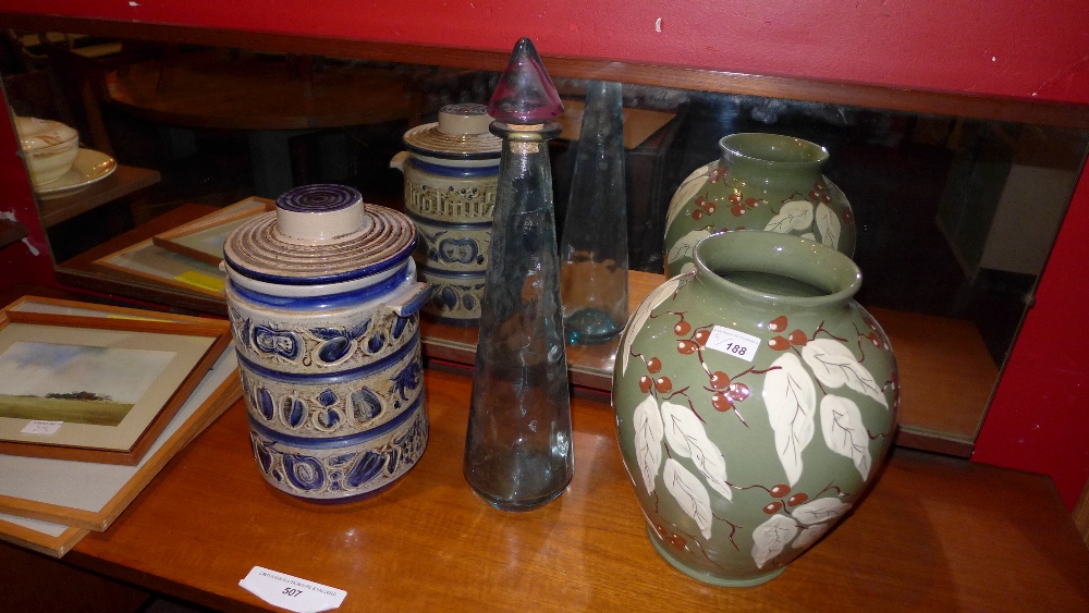 A Barum ware jardiniere, a West German lidded jar and a tall glass bottle with stopper