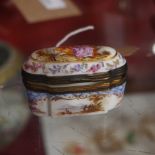 A C19th Continental porcelain pill box with pictorial reserve