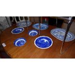 A collection of blue and white meat plates and bowls including examples by Royal Doulton and