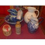 An Ironstone blue and white toilet jug and basin together with a similar jug, a Salvation Army