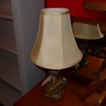 A pair of Neoclassical design gilded table lamps with shades