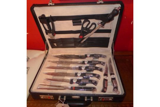 A complete cased Rosenbaum knife set including cookery knives and meat cleaver, st