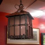 A copper and iron hall lantern with glazed panels