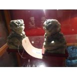 A pair of Chinese carved hardstone Kylin figures on stands