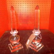 A pair of glass obelisks