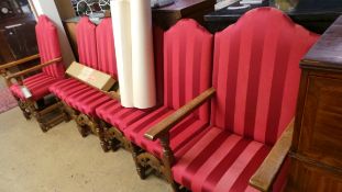 A set of six Carolean style oak chairs with red upholstered seats