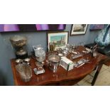 A collection of various silver plated items including trophies,