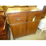 A George III inlaid mahogany secretaire chest fitted above cupboards