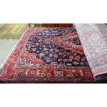 A fine central Persian Sarouk rug 225 cm x 140 cm central pendant medallion,
