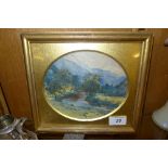 A watercolour of highland river scene in gilt frame