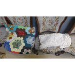 A patchwork quilt together with a lace bed throw (2)