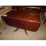 A Regency mahogany pedestal Pembroke table
