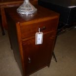 A walnut side cabinet fitted single drawer and panel door