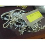 A collection of pearl necklaces, jet necklace,