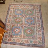 A handwoven Kazak rug,